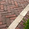 Unilock Copthorne Paver Burgandy Red 2-1/2 in. x 8 in. 6 cm (89.2 sq. ft./pallet)